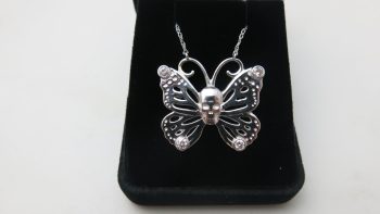 skull butterfly pendant